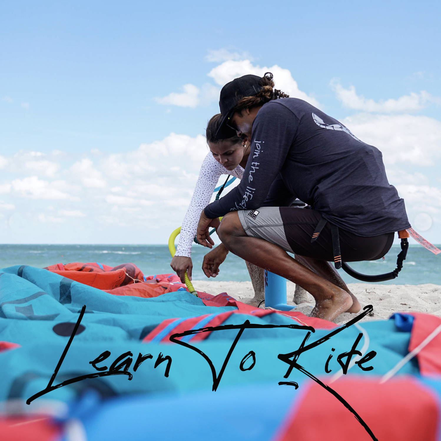 TKSMIAMI kite instructor giving a class of how to prepare a kite for flying